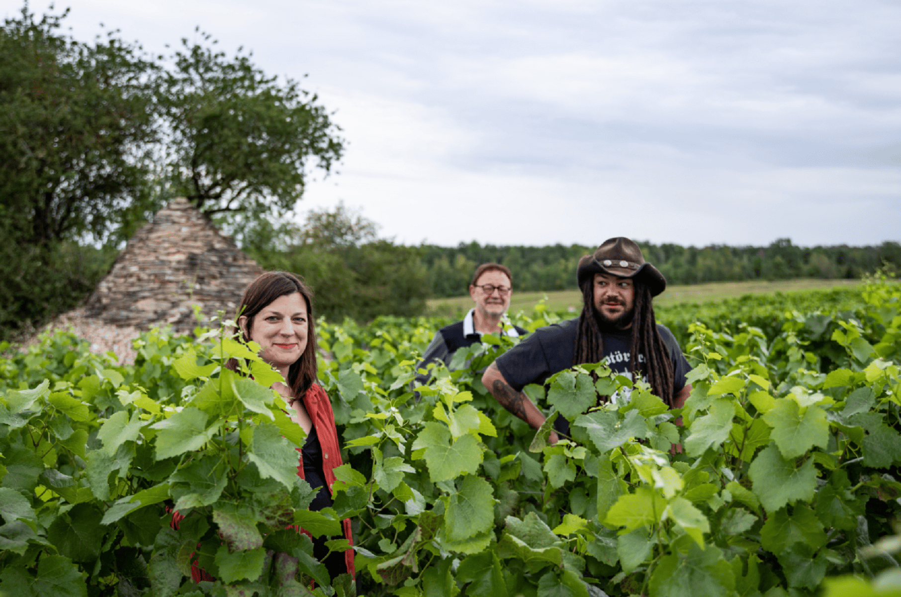 Pascal, Emilie and Simon Morel in the vineyard